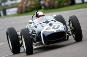 Sir Stirling Moss driving his Lotus 18 at the 2009 Goodwood Revival