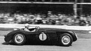 Stirling Moss racing a C-type Jaguar in 1953