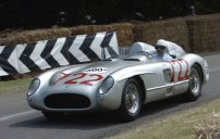 Sir Stirling Moss driving his Mille Miglia-winning Mercedes at the Goodwood Revival event in 2005