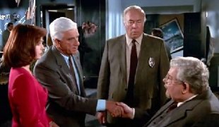 Leslie Nielsen, Priscilla Presley, George Kennedy & Richard Griffith in 'The Naked Gun 2 1/2'