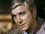 Leslie Nielsen as John Bracken in 'Bracken's World'