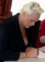 Brigitte Nielsen signing Ciaran's photograph