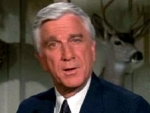 Leslie Nielsen as Mallory in 'Wrong is Right'