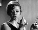 Margaret Nolan as a secretary in 'The Saint' (1963)