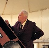 Sir Patrick Moore in his observatory at Farthings