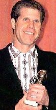 Ron Perlman with his Golden Globe award in 1989