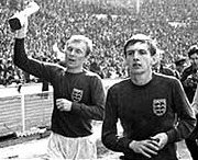 Bobby Moore and Martin Peters leaving the field after the World Cup final