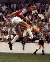 Martin Peters playing for West Ham United