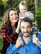 John Rhys-Davies with partner Lisa Manning and their young daughter.