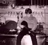 Young Tim Robbins with his guitar