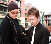 Tim Robbins signing Ciaran Brown's photograph