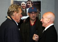 Patrick Stewart and his son Daniel discuss football with Martin Chivers at the MK Dons stadium