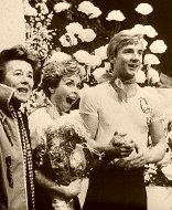 Torvill and Dean with coach Betty Calloway watch the scores for their 'Bolero' routine  in 1984