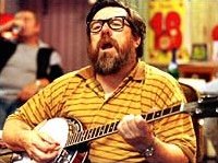 Ricky Tomlinson plays his banjo in 'The Royle Family'