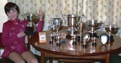 A young Jayne Torvill with her ice skating trophies