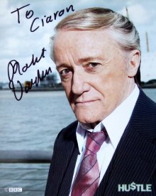 Signed photo of Robert Vaughn in the BBC series 'Hustle'