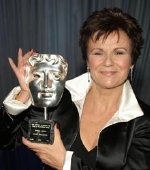 Julie Walters with one of her BAFTA Awards