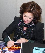 Claudia Wells signing 'Back to the Future' masterprint