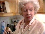 June Whitfield as Mrs White the housekeeper in 'Cluedo'