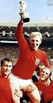 Hurst, Moore and Wilson celebrate after the 1966 World Cup final