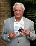 Michael Winner with his autobiography 'Winner Takes All'