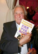 Michael Winner with his book 'Fat Pig Diet'