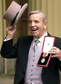 Sir Norman Wisdom after receiving his knighthood in 2000