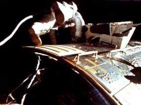 Al Worden makes a 'space walk' to retrieve film from the Endeavour's external cameras.  This is a still image from Jim Irwin's 16mm movie footage.