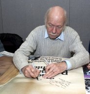 Brian Murphy signing 'The Ragman's Daughter' poster