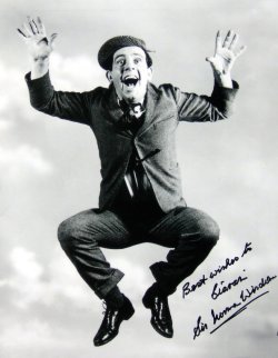 Photograph signed by Sir Norman Wisdom 