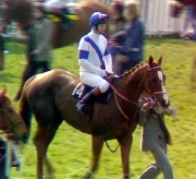 Bob Champion on Aldaniti in the parade ring before the start of the 1981 Grand National