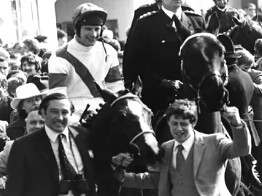 Nick Embiricos and Peter Double lead Aldaniti & Bob Champion into the winner's enclosure at Aintree