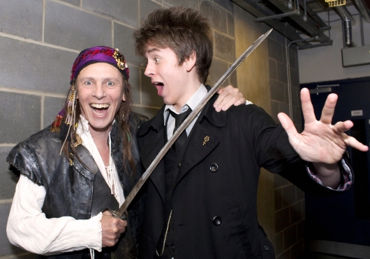 Ciaran Brown meets Paul Nicholas (as the Pirate King in 'The Pirates of Penzance') at the Milton Keynes Theatre in May 2010