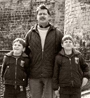 Eddie Izzard (left) with his father and brother