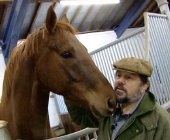 Jethro in his purpose-built stables with his favourite horse