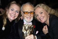 Juliet & Hayley Mills and their father Sir John Mills with his BAFTA Fellowship Award in 2002