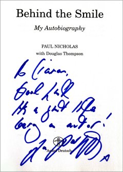 Title page of 'Behind the Smile' signed by Paul Nicholas 