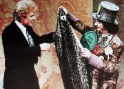 Paul Nicholas is presented with his leopardskin 'Savages' costume by Lord Sutch on 'This is Your Life'