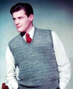 Roger Moore models knitwear in the 1950s